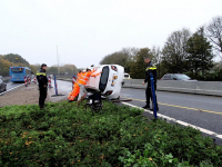 Auto over de kop Dordrecht