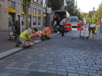 Werklui werken door in de hitte