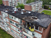 Schade aan portiekflat enorm Troelstraweg Dordrecht