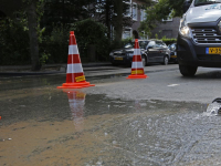 Gesprongen waterleiding zet deel Singel blank Dordrecht