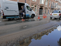 Gesprongen waterleiding zet deel Singel blank Dordrecht