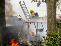 Graafmachine en container in brand Rijksstraatweg Dordrecht