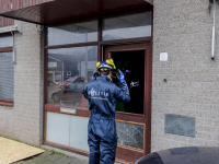 Forensische Opsporing doet onderzoek naar brandoorzaak Daltonstraat Dordrecht