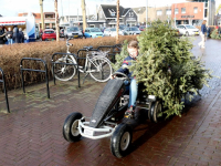 Kerstbomen inzamelen Damplein Dordrecht