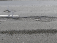 gaten in de weg Mijlweg Dordrecht