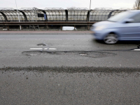 gaten in de weg Mijlweg Dordrecht