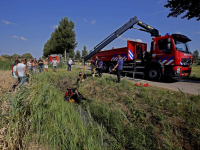 Paard na ruim uur gered uit sloot